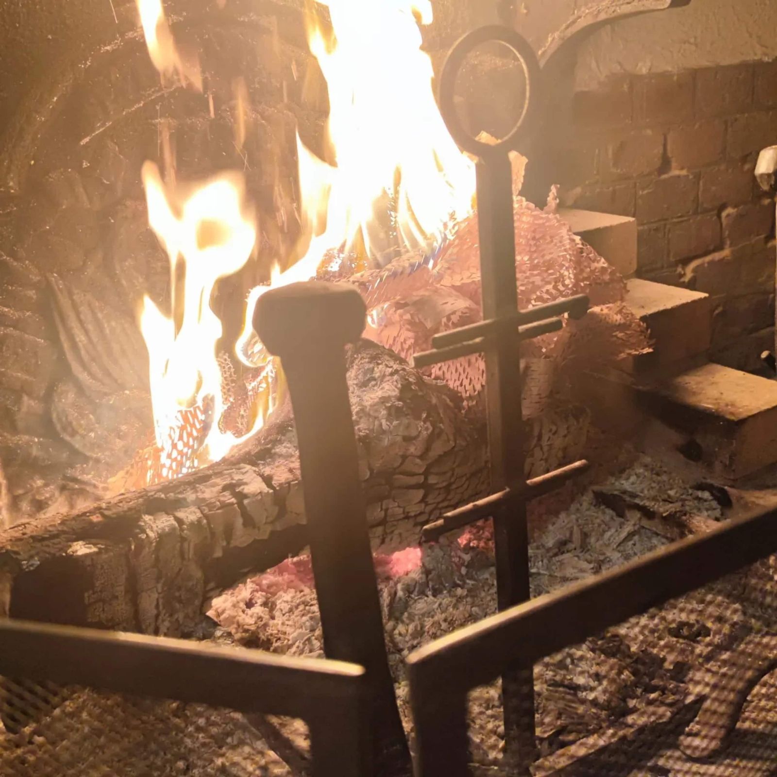 A log fire in the fireplace